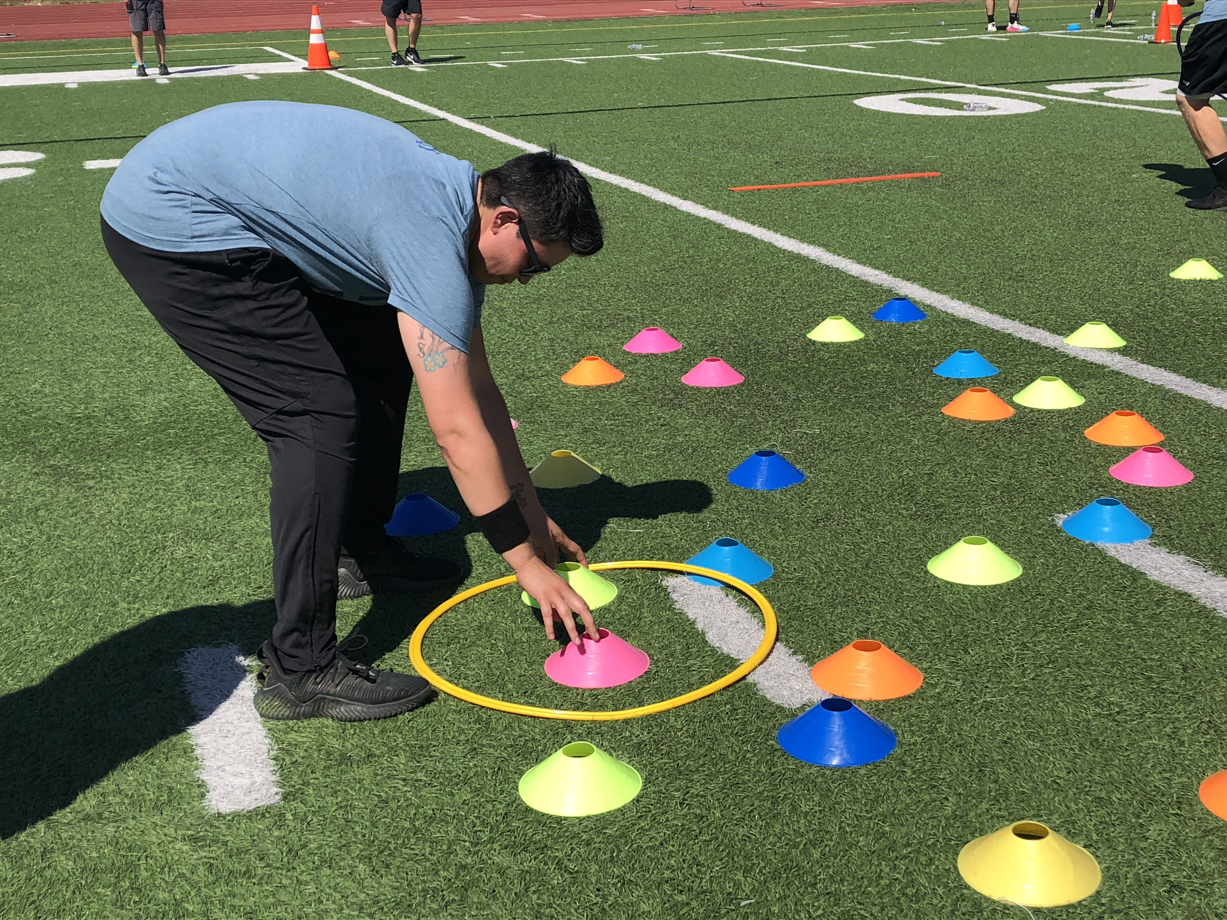 team building activity at R&H field day on the football field